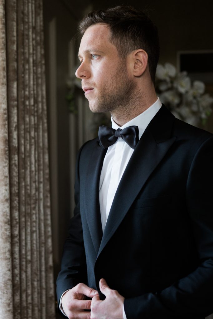 Groom portrait at Carlowrie Castle Wedding by Fine Art Wedding Photographer based in the UK photo