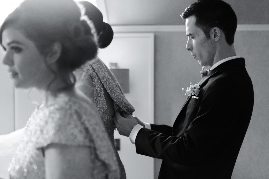 Black and white candid wedding photography by Cheshire Wedding Photographer