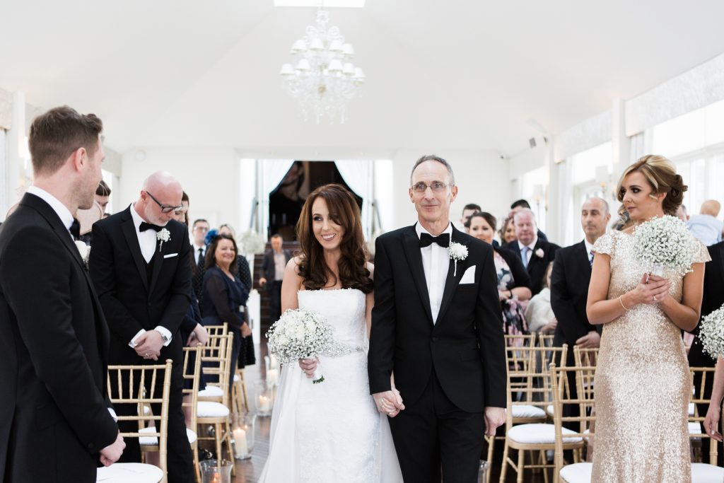Arrival of the bride at a Carlowrie Castle Wedding by Fine Art Wedding Photographer Jade Osborne.
