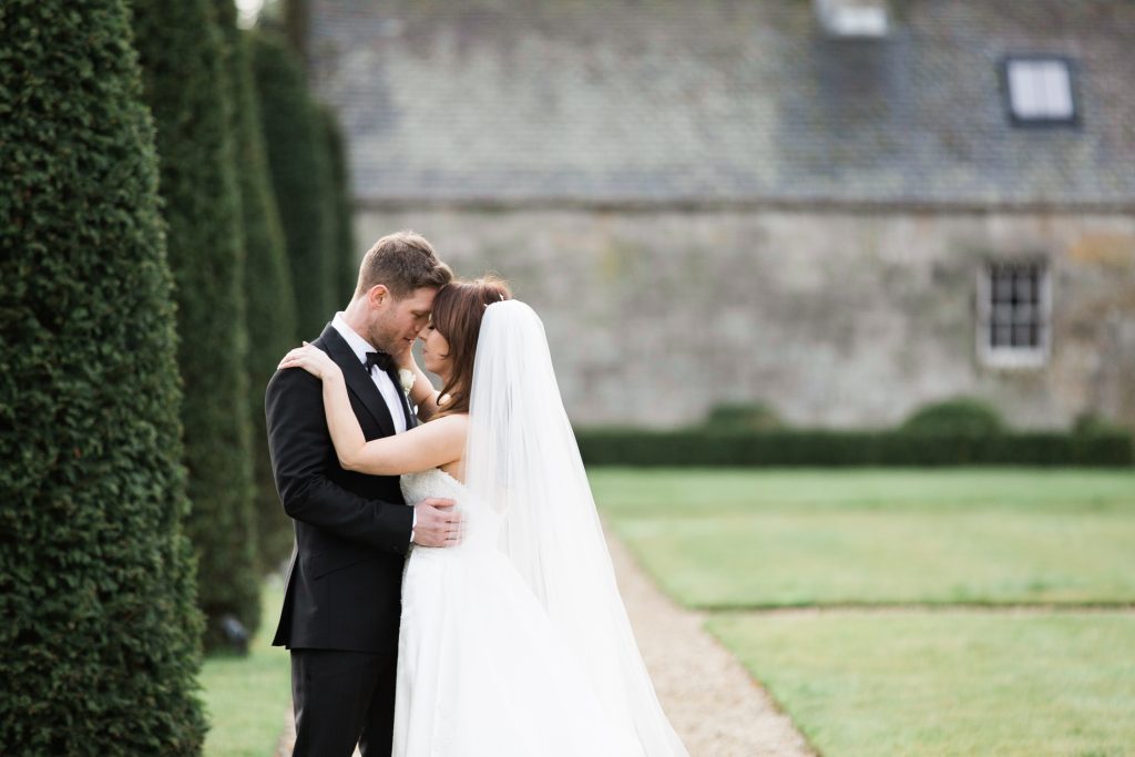 Bride and groom portraits at a winter wedding at Carlowrie Castle in Edinburgh, Scotland