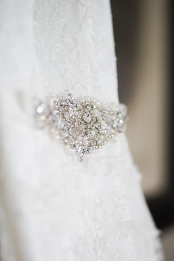 Details on Suzanne Neville gown at Carlowrie Castle Wedding.