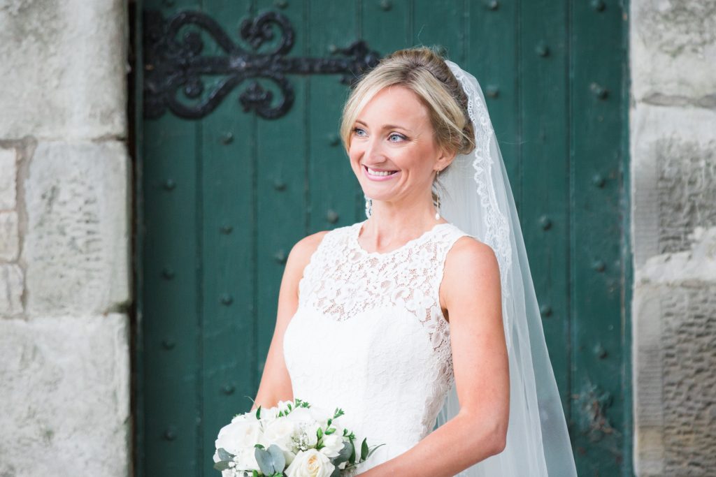 Bride wearing Caroline Castigliano wedding gown at Scottish Castle wedding by Fine art wedding photographer Jade Osborne Photography