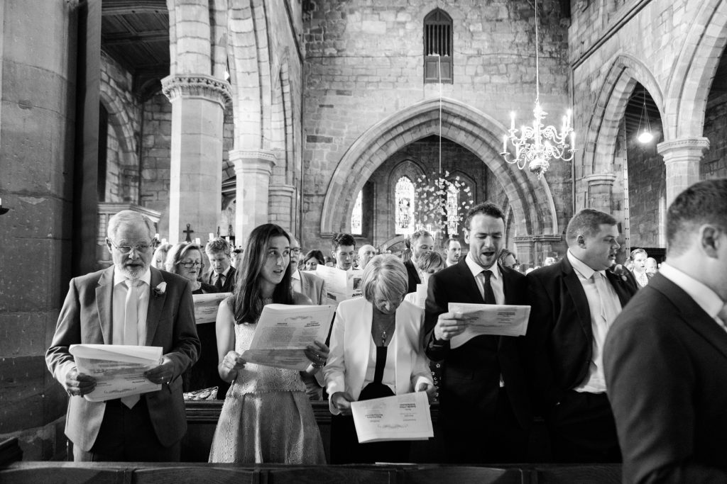 Documentary wedding photography at Acton church in Nantwich photo