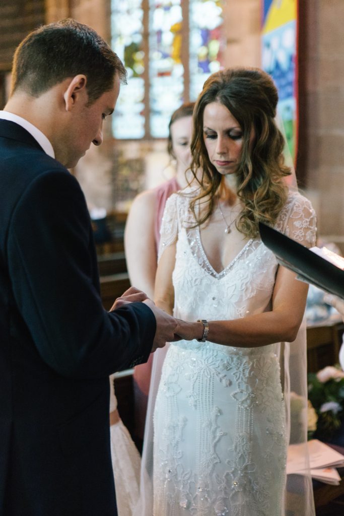 Candid documentary wedding photography at Acton church in Nantwich photo