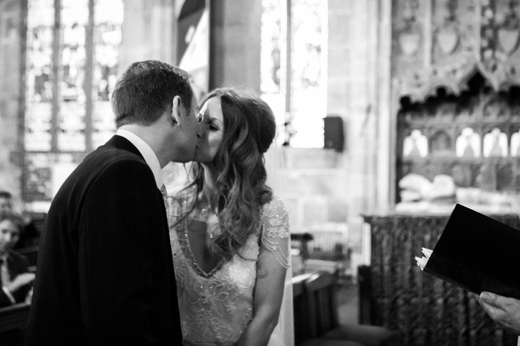 Candid documentary wedding photography at Acton church in Nantwich photo