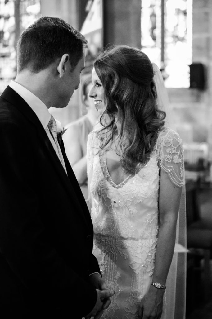 Candid documentary wedding photography at Acton church in Nantwich photo
