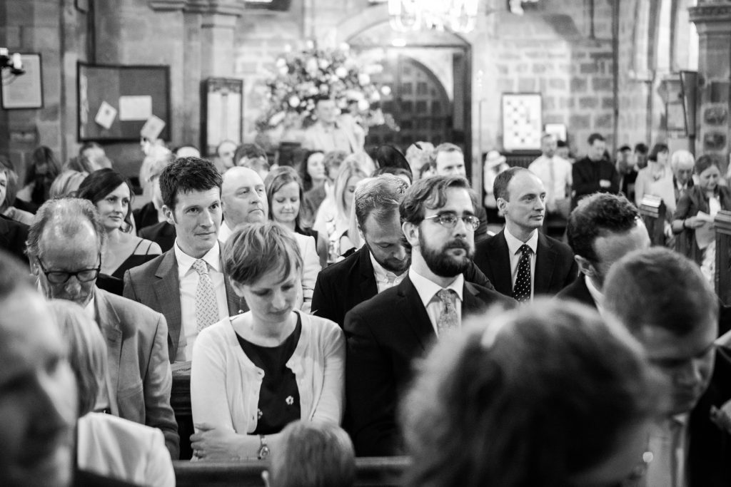 Candid documentary wedding photography at Acton church in Nantwich photo