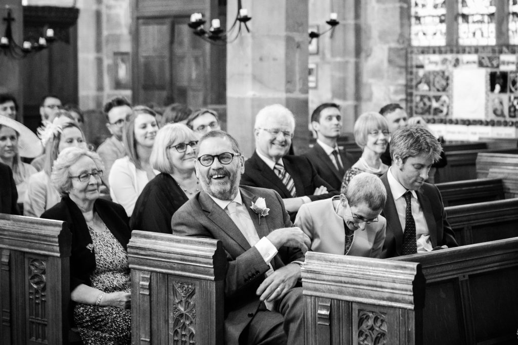 Candid documentary wedding photography at Acton church in Nantwich photo