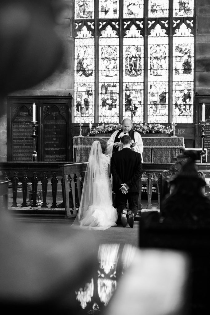 Candid documentary wedding photography at Acton church in Nantwich photo