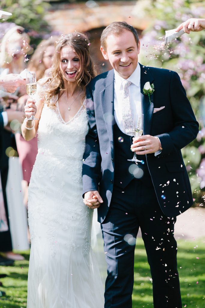 Dorfold Hall Wedding photography featuring confetti shot in the gardens photo