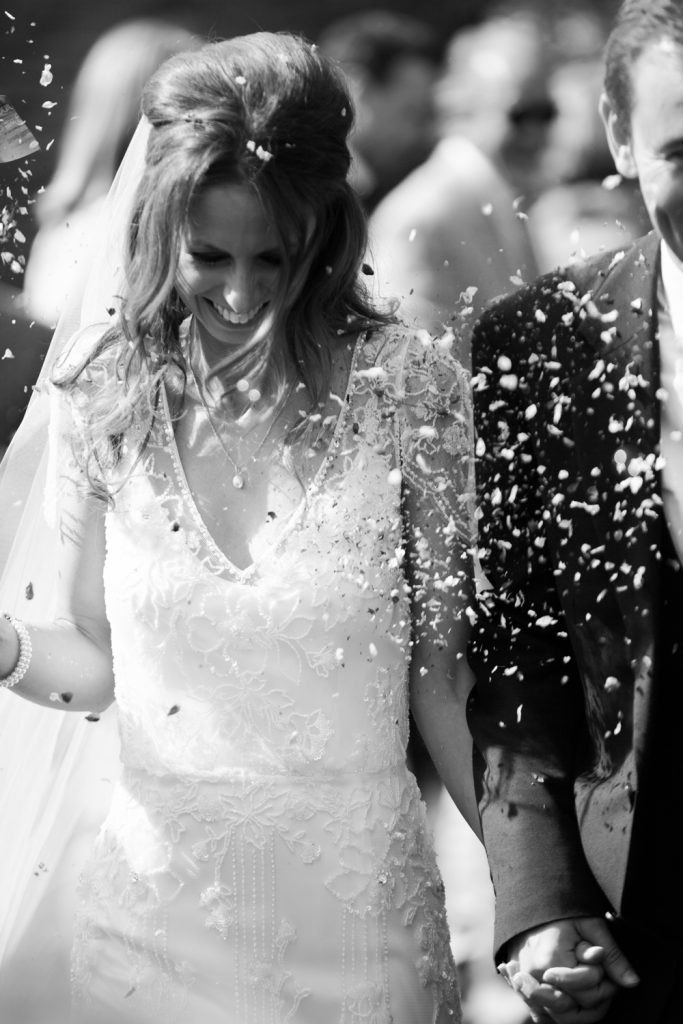 Dorfold Hall Wedding photography featuring confetti shot in the gardens photo
