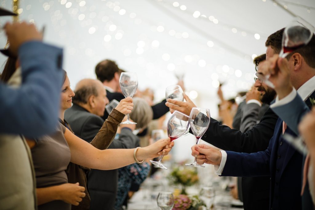 Speeches in the sperry tent at Dorfold Hall wedding in Cheshire
