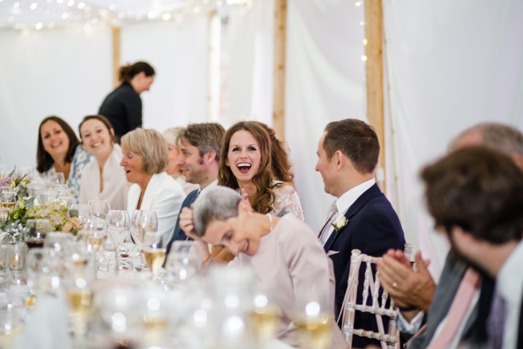 Speeches in the sperry tent at Dorfold Hall wedding in Cheshire