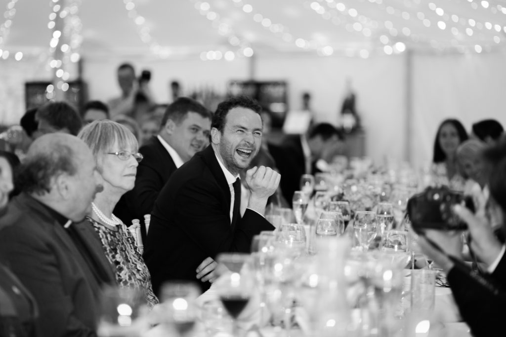 Speeches in the sperry tent at Dorfold Hall wedding in Cheshire