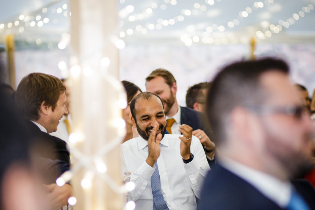 Speeches in the sperry tent at Dorfold Hall wedding in Cheshire