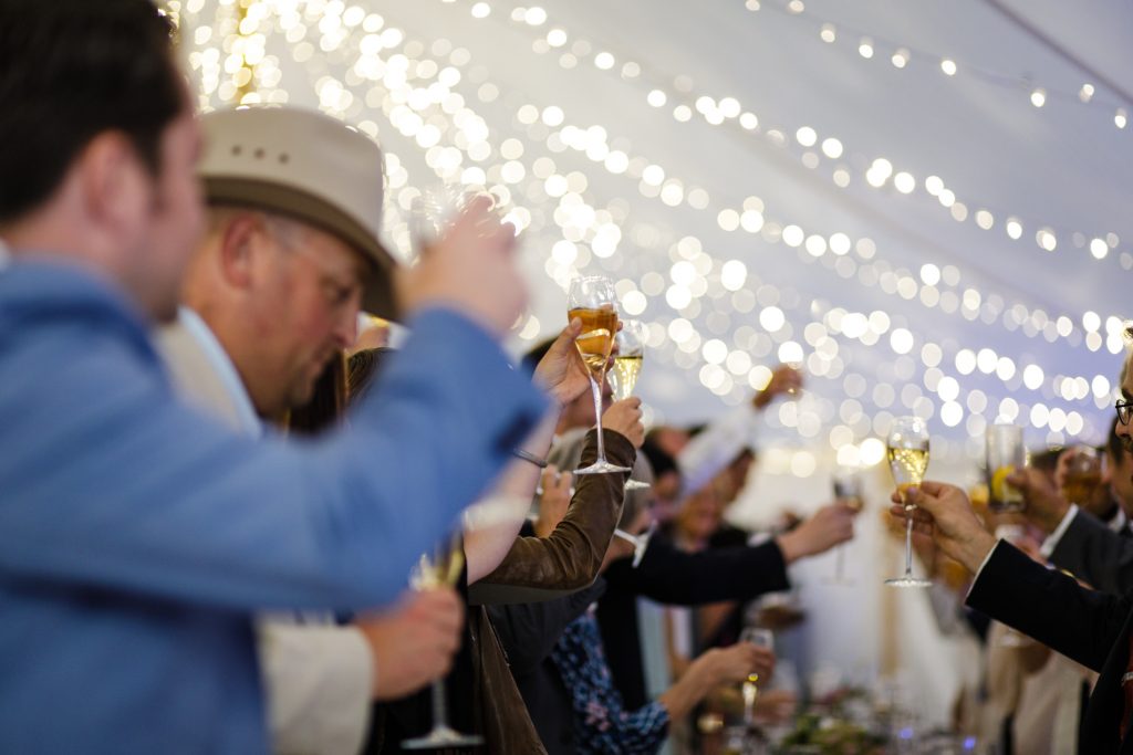 Speeches in the sperry tent at Dorfold Hall wedding in Cheshire