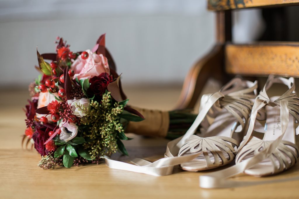 Harriet Wilde gold wedding shoes at Farbridge Barns wedding