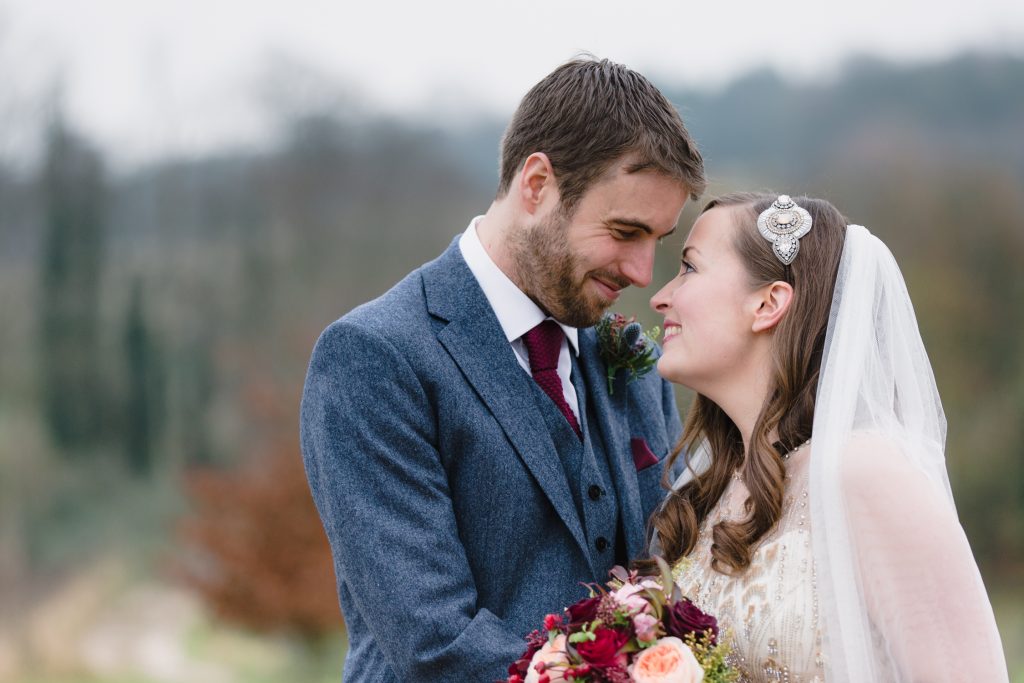 Portraits of bride and groom for a winter wedding at Farbridge Barns. Fine art Wedding Photography in the UK.