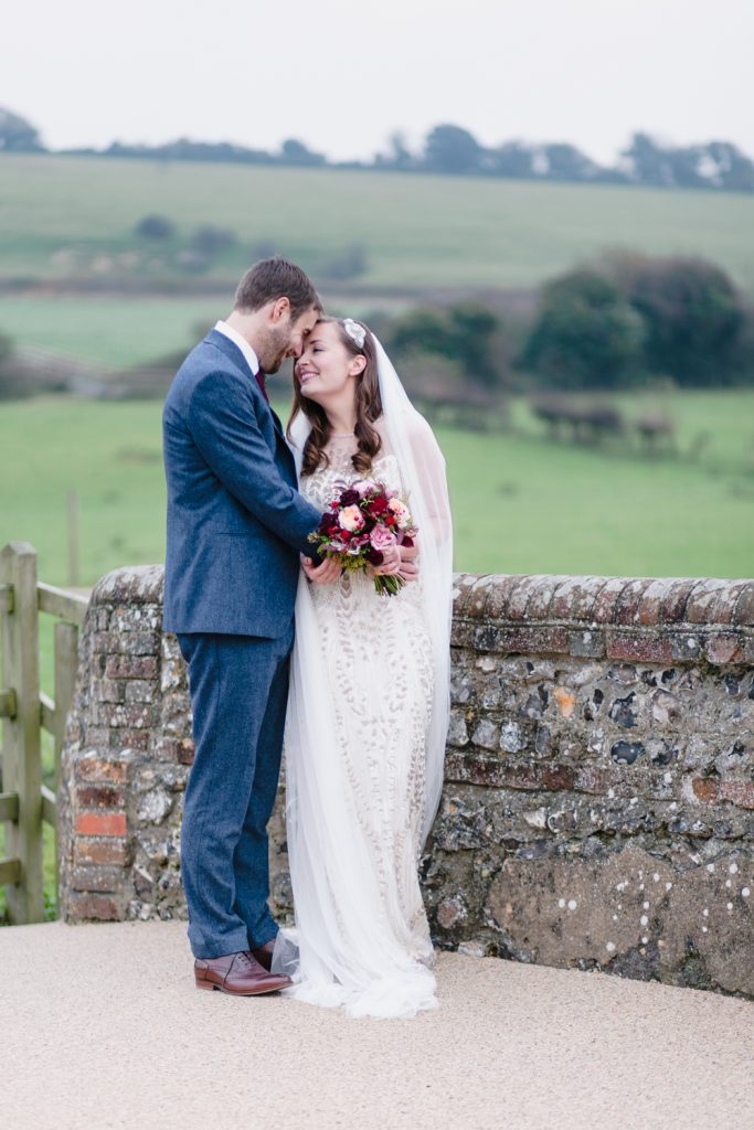 Winter wedding couple portraits by UK fine art wedding photographer based in Cheshire.