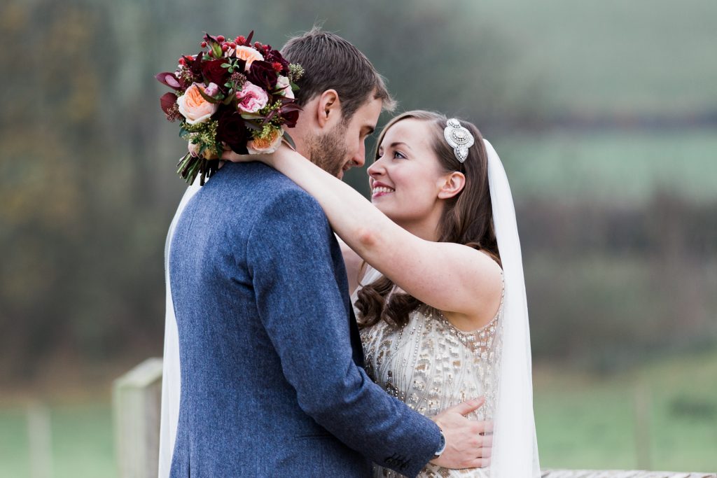 Couples wedding portraits for a winter wedding. The bride wears Jenny Packham bridal and groom in a blue Reiss tweed suit. Fine Art Wedding Photography Portraits.