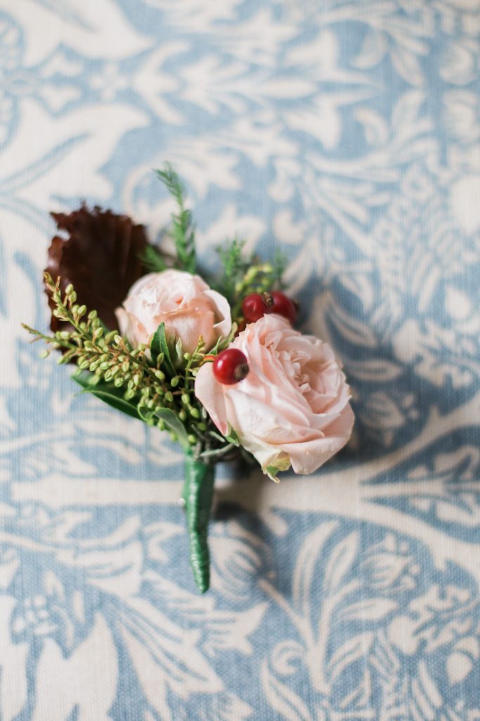 Winter wedding buttonhole inspiration from a Farbridge Barns wedding in Chichester.