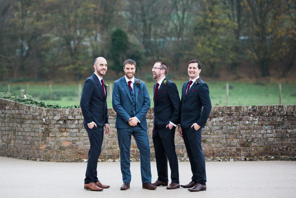 Groom with groomsmen group shot by Cheshire wedding photographer Jade Osborne.