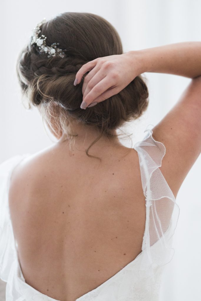 Low back wedding dress detail by Sarah Willard Couture by UK Wedding Photographer
