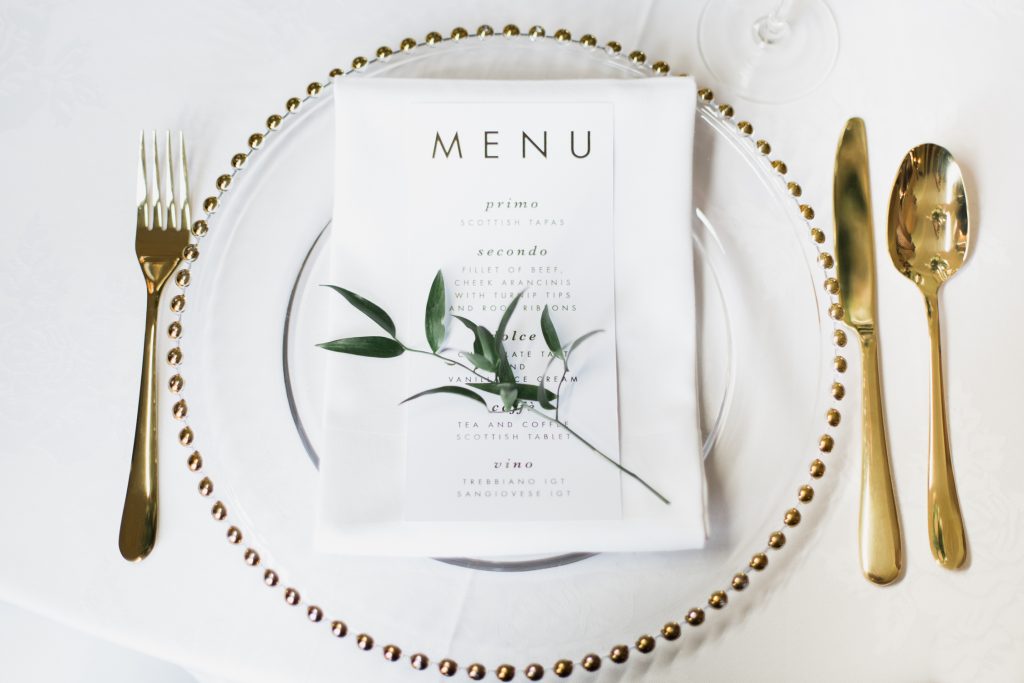 Table setting ideas for wedding at Sandon Hall. Featuring gold foil menu cards by E.y.i Love captured by Fine art wedding photographer Jade Osborne Photography.