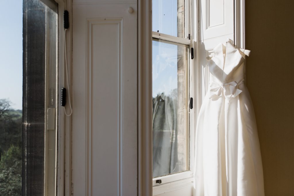 Jesus Peiro wedding dress with large bow for a bridal inspiration shoot at Sandon Hall, Staffordshire - photo