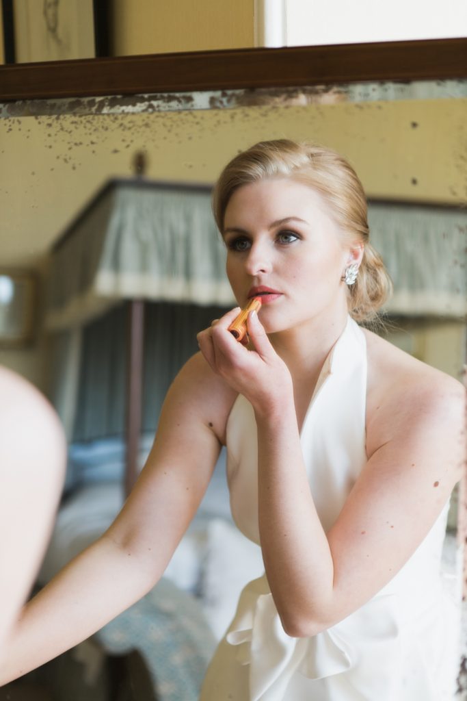 Bridal prep at Sandon Hall, Staffordshire. The bride wearing a Jesus Peiro wedding gown.