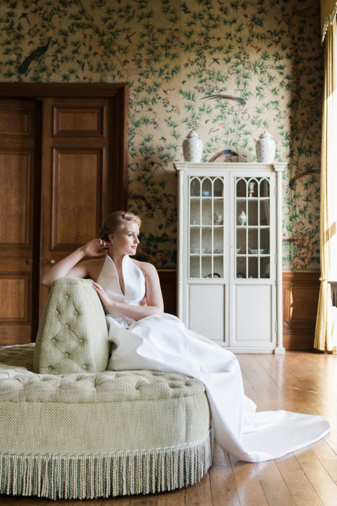 Bridal portrait at Sandon Hall, Staffordshire in the drawing room featuring Chinoiserie wallpaper