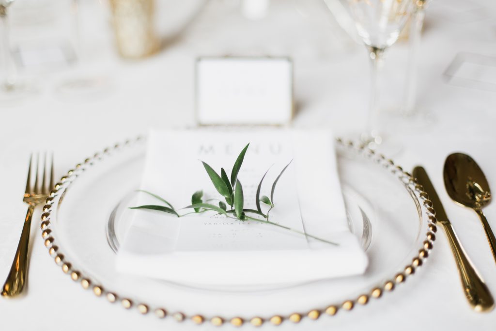 Wedding table details with gold foil menu cards captured by Cheshire wedding photographer Jade Osborne Photography.