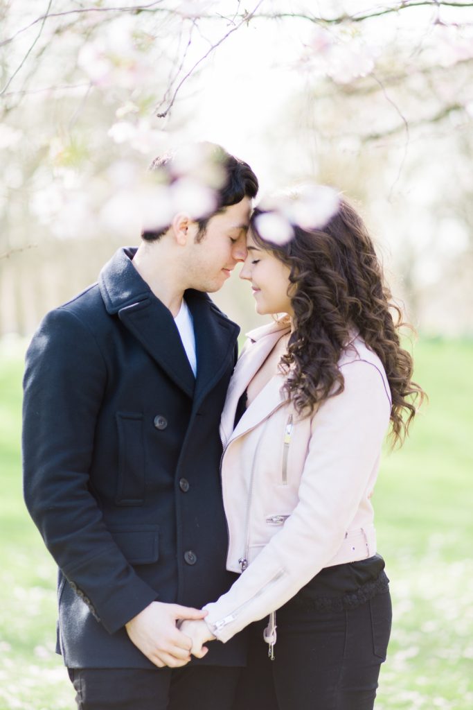 Fine Art Wedding Photographer UK Based. An Engagement shoot in London in the spring with blossom in St James' Park.