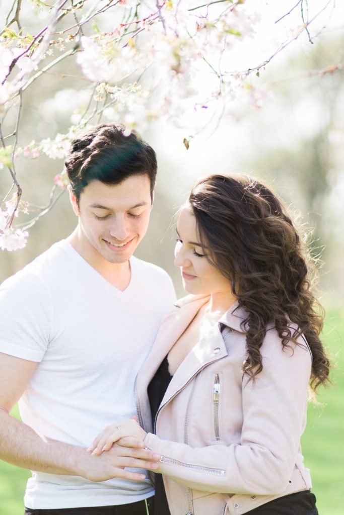 Fine Art Wedding Photographer UK Based. An Engagement shoot in London in the spring with blossom in St James' Park.