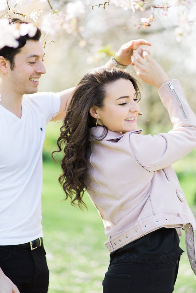 Fine Art Wedding Photographer UK Based. An Engagement shoot in London in the spring with blossom in St James' Park.
