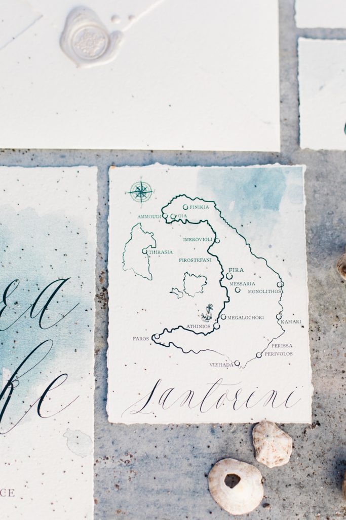 Blue and calligraphy wedding stationery for a Santorini wedding photo