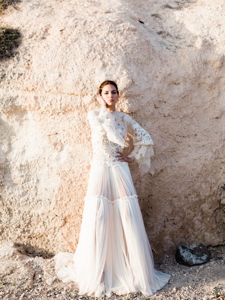 UK Destination Wedding Photographer featuring bridal portrait on the beach in Santorini