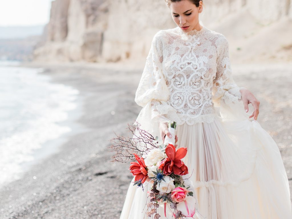Cheshire Wedding Photographer covering destination weddings featuring bride at a beach wedding