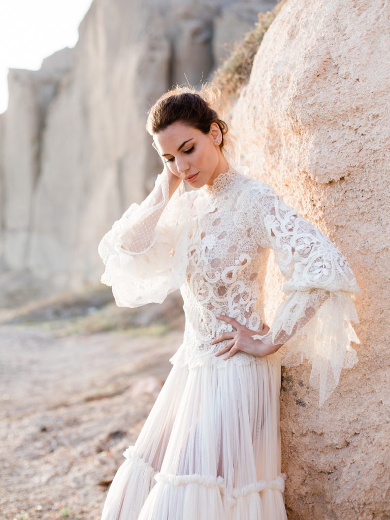 Fine are wedding photographer featuring bride in lace wedding dress from Christos Costarellos