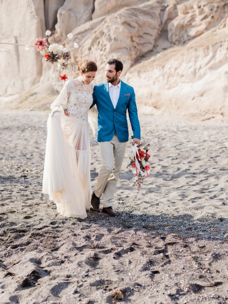 Wedding dress for a beach wedding featuring Costarellos gown by UK Wedding Photographer