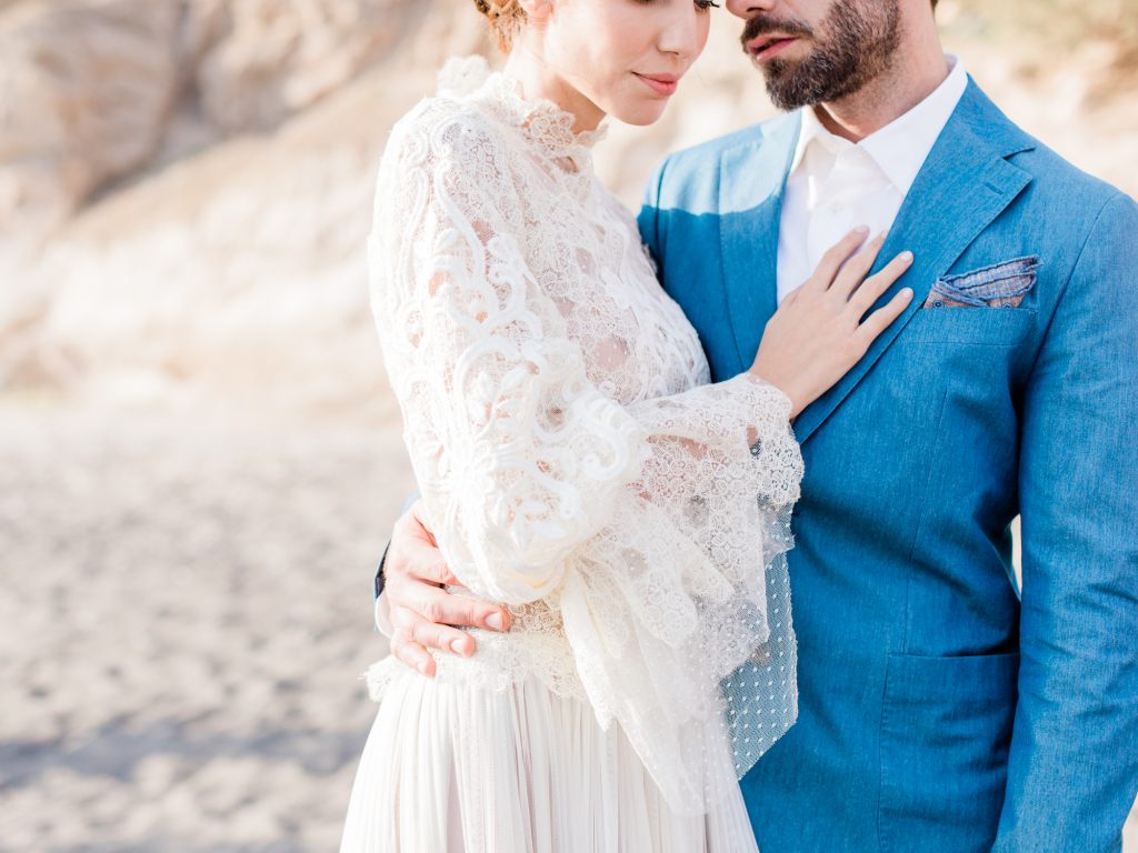 Bride and groom portraits from a beach wedding.