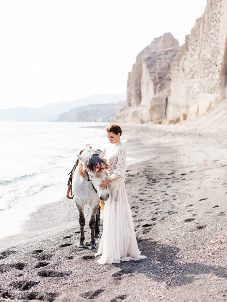 Beach wedding featuring bride in Costarellos wedding dress by UK Fine Art Wedding Photographer