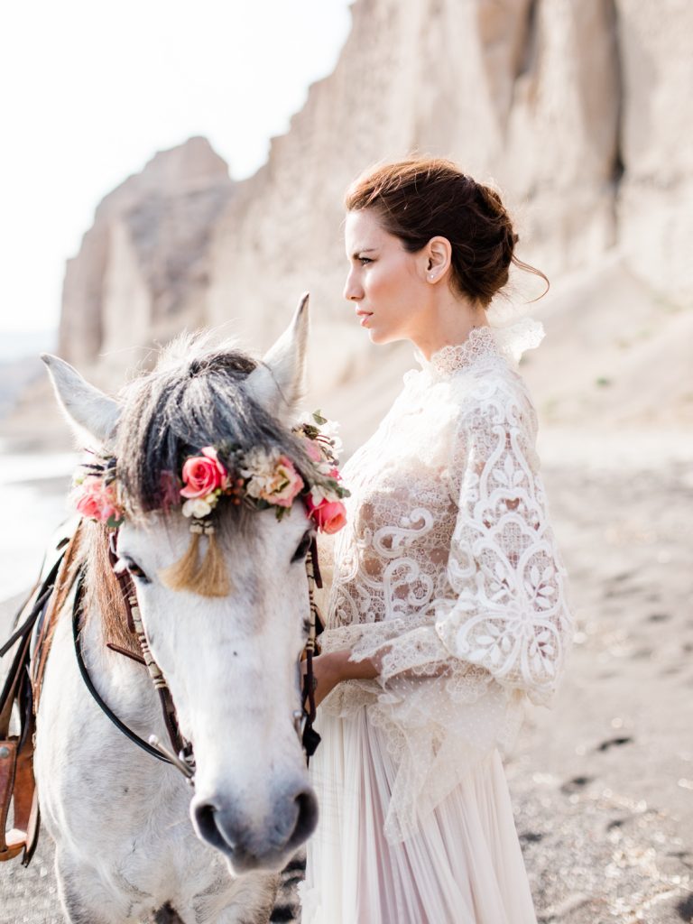 Bridal portrait by Cheshire based wedding photographer featuring beach wedding in Santorini