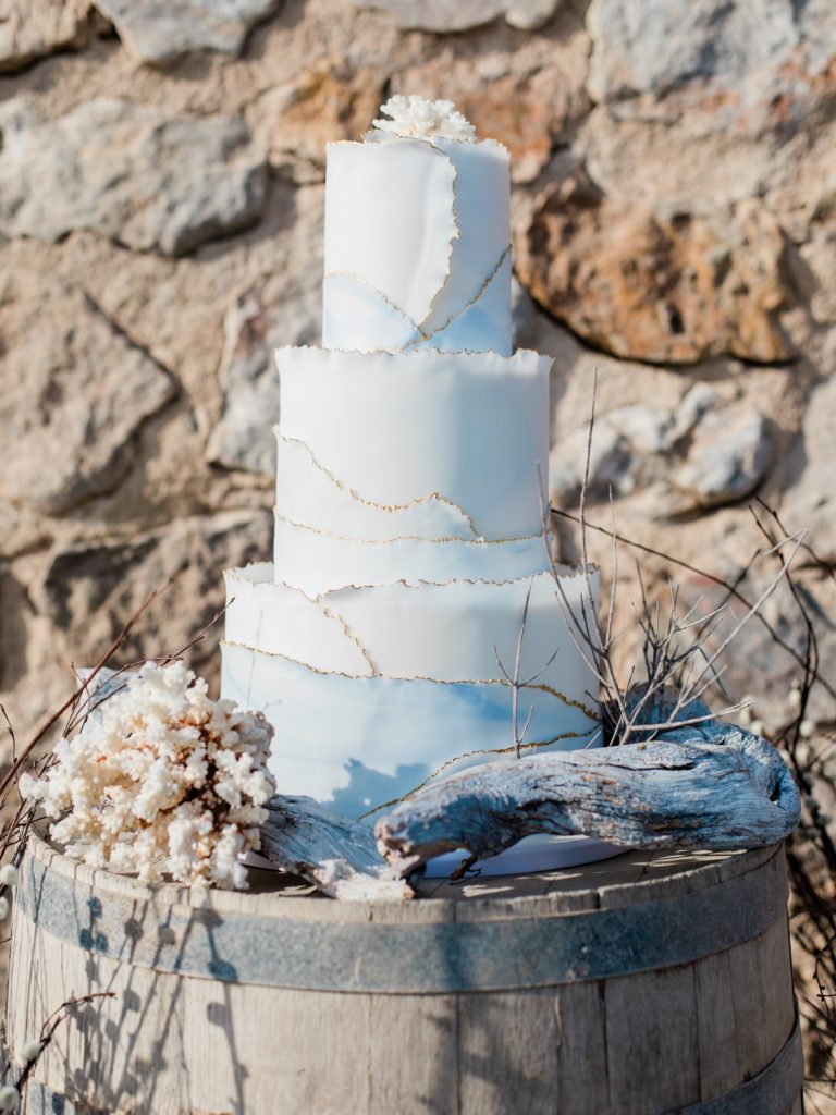 Cake details for an editorial styled beach wedding in Santorini