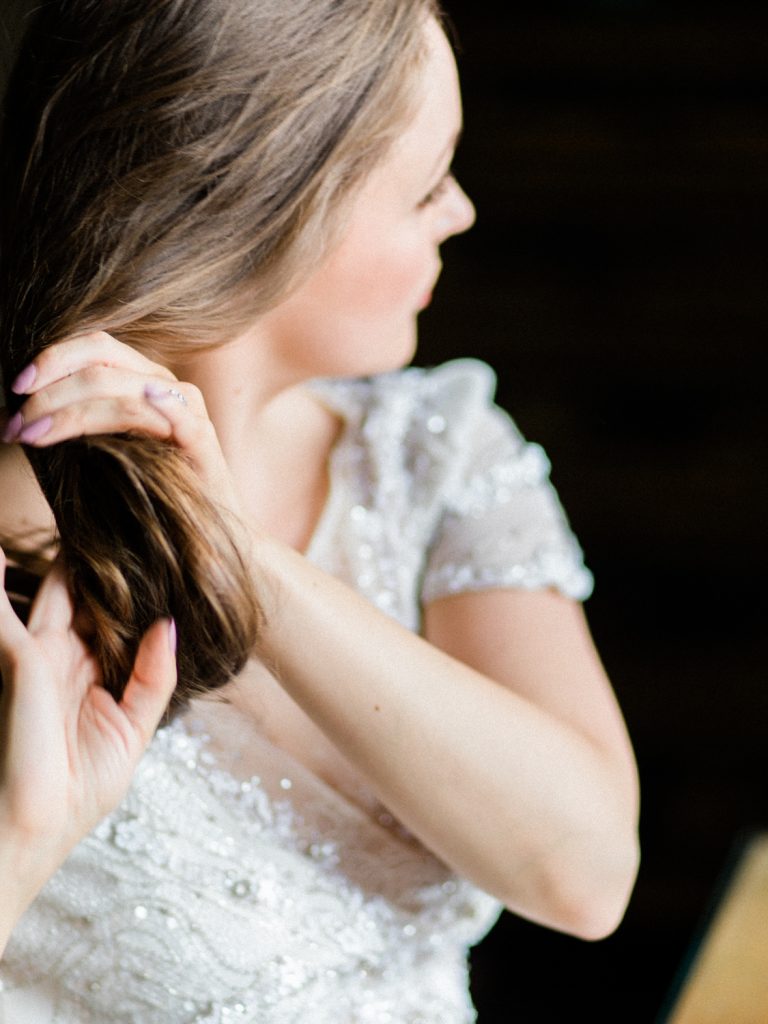 Bridal preparation at Dorfold Hall by fine art wedding photographer based in the UK. Bride is wearing a Jenny Packham gown.