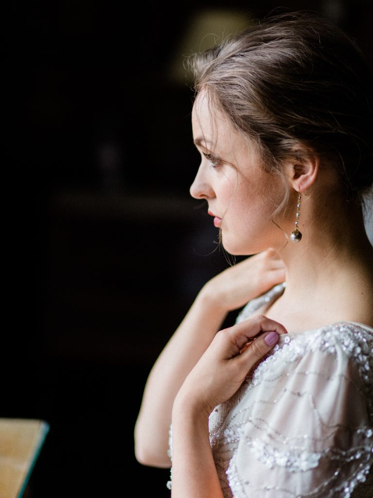 Bridal preparation featuring bride in Jenny Packham bridal for an elegant and intimate inspiration shoot at Dorfold Hall wedding venue in Cheshire