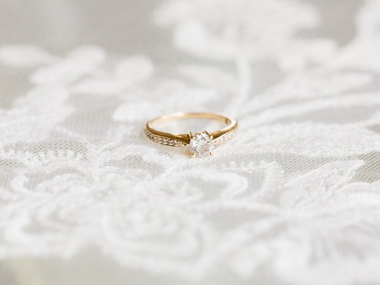 Gold and diamond engagement ring by Fine Art Wedding Photographer based in the UK
