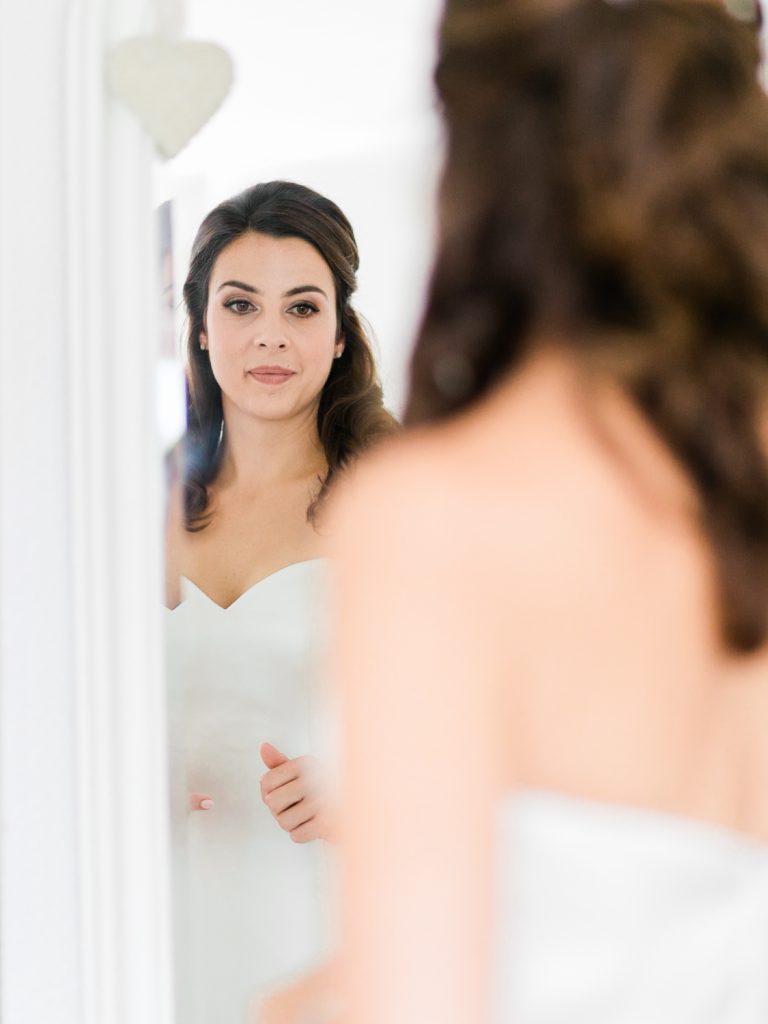 Bride getting ready wearing Justin Alexander for a country mansion wedding in Shropshire.