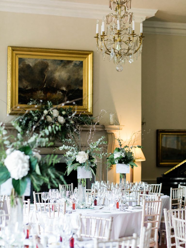 White florals for a luxury wedding in the UK by Fine art Wedding Photographer.