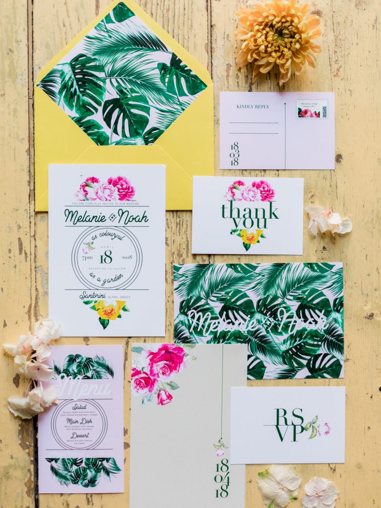 Flat lay stationery suite for a Santorini wedding